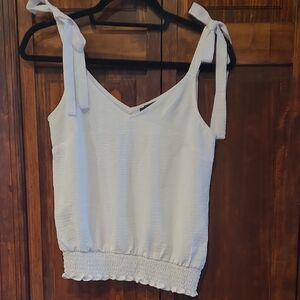 1. State White Tank Top with Tie Straps
